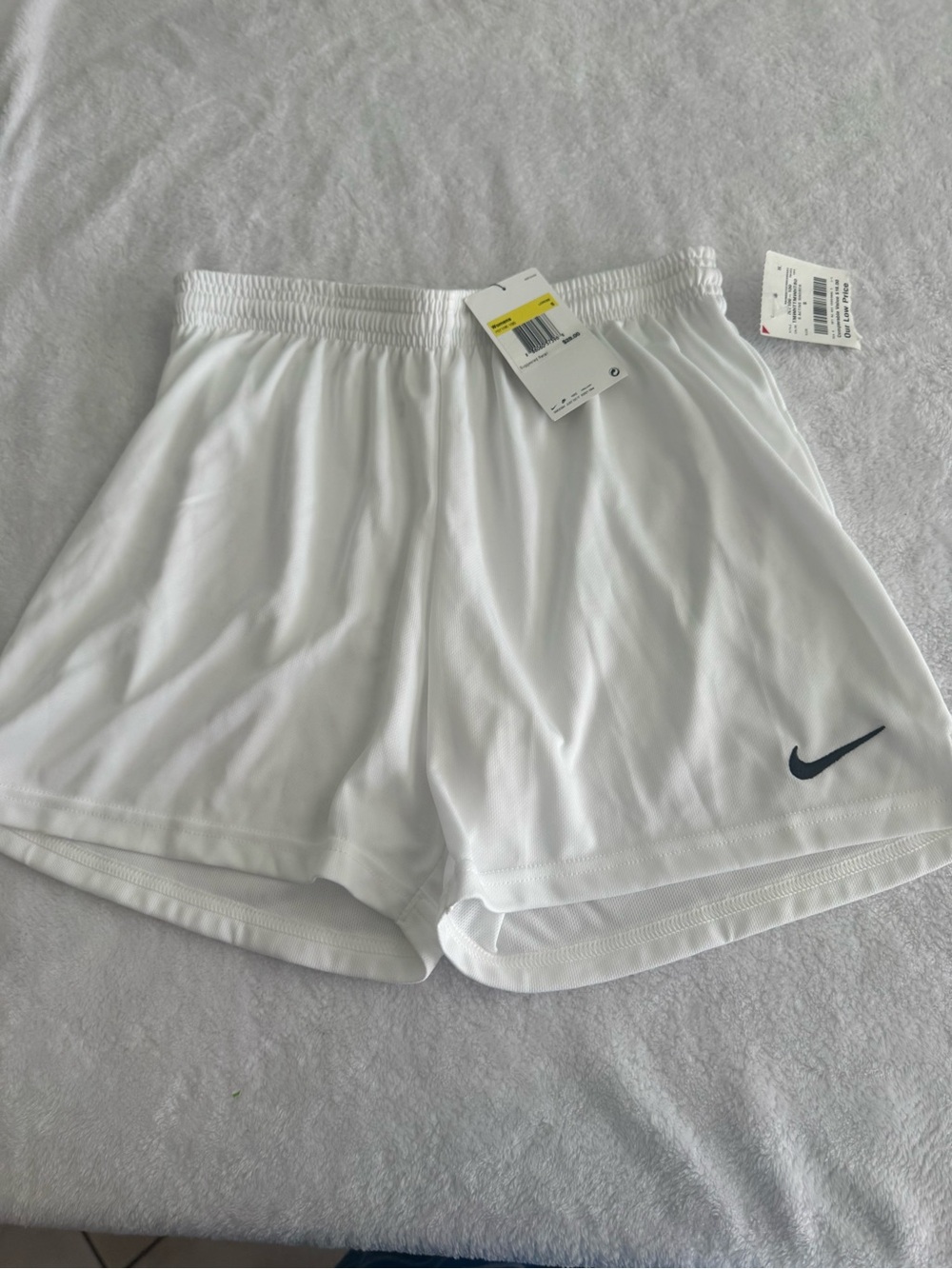 Nike White Women’s Athletic Shorts with Navy Swoosh